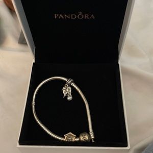 Pandora bracelet with two charms - barely worn